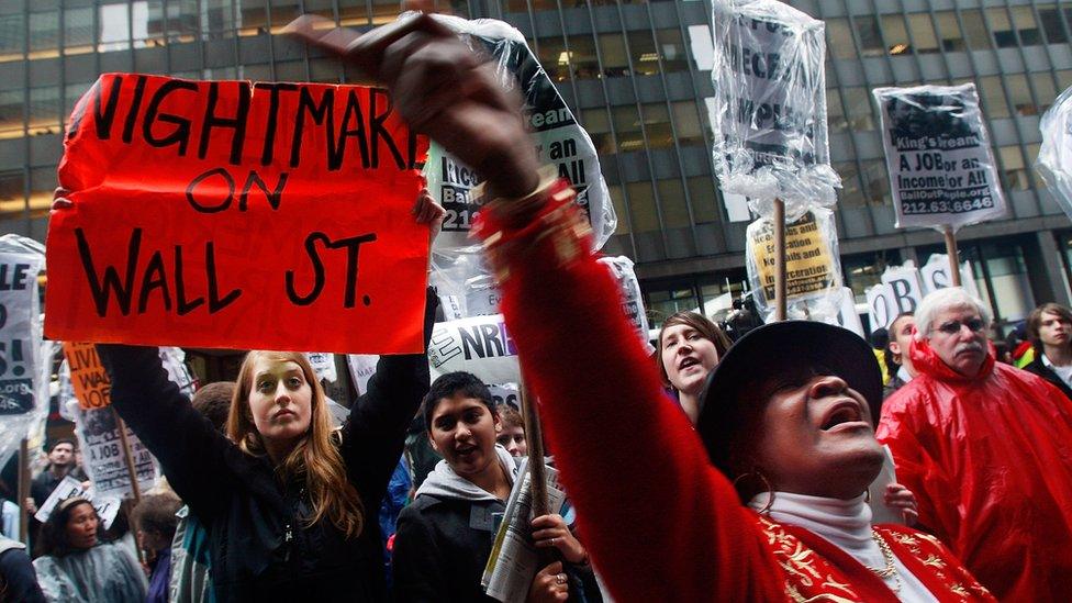 People demonstrate in the financial district April 3, 2009 in New York City. Hundreds of anti-capitalist protesters gathered in the financial district to begin a two- day rally against Wall St. and the recent government bailout of banks and financial institutions.