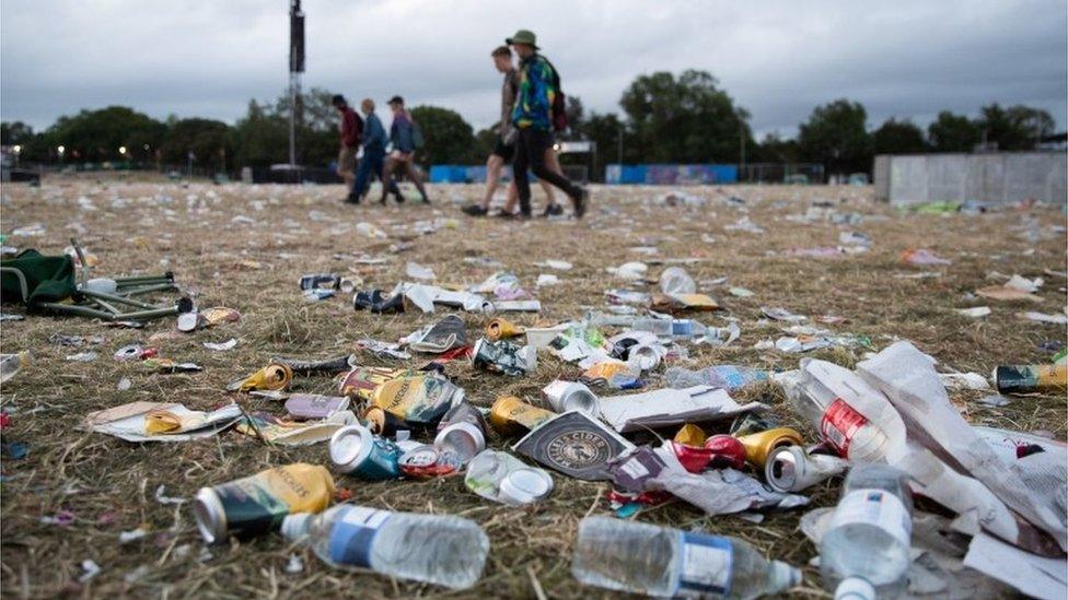 Discarded plastic bottles been left behind by festival-goers