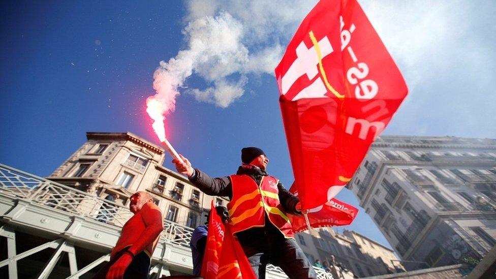 French CGT labour union workers attend a demonstration against government pension reform plans in Marseille on 10 December 2019