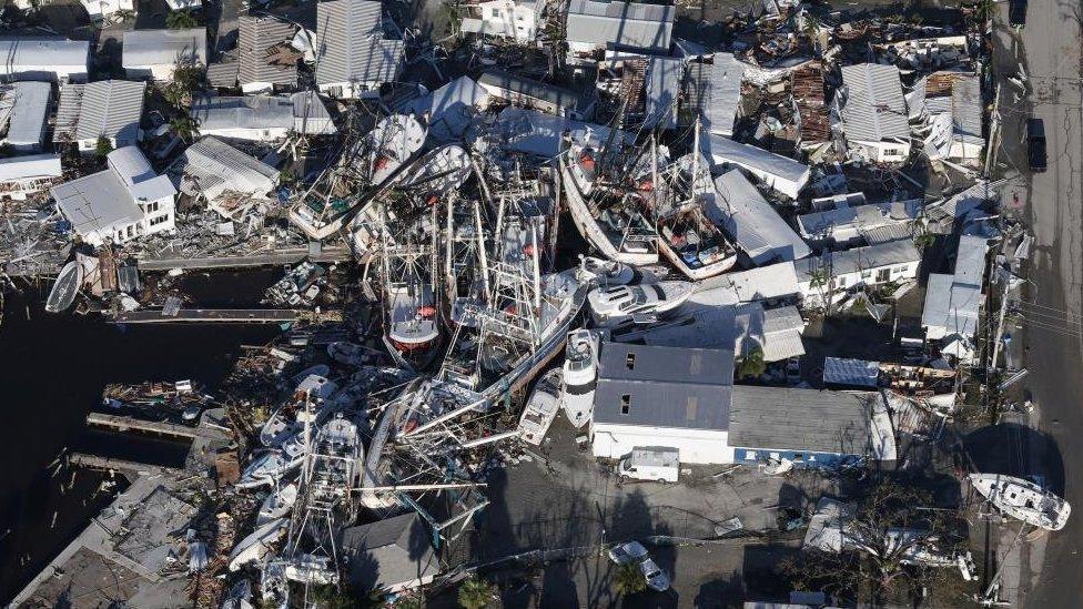 Destroyed boats in a marina