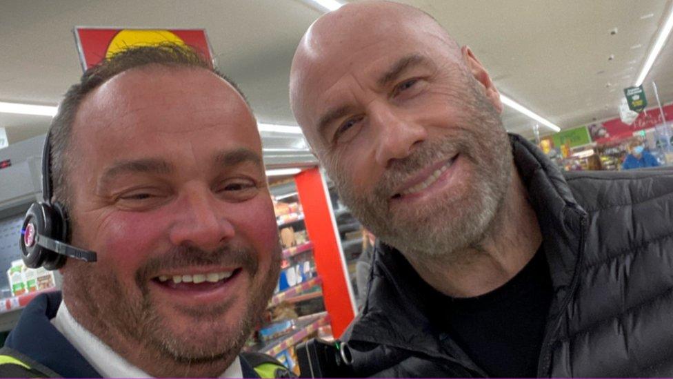 Morrisons security guard, Gary Middleton with John Travolta