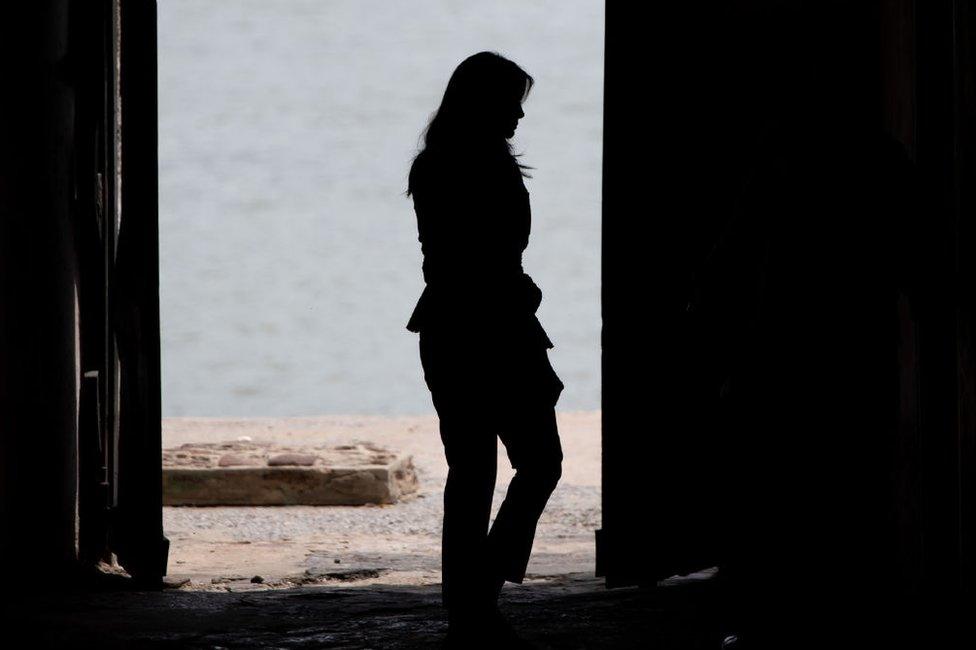 US First Lady Melania Trump walk through the Door of No Return (where slaves were loaded onto ships and sold in the Americas) as she tours the Cape Coast Castle, a former slave trading fort, in Cape Coast, Ghana, on October 3, 2018.