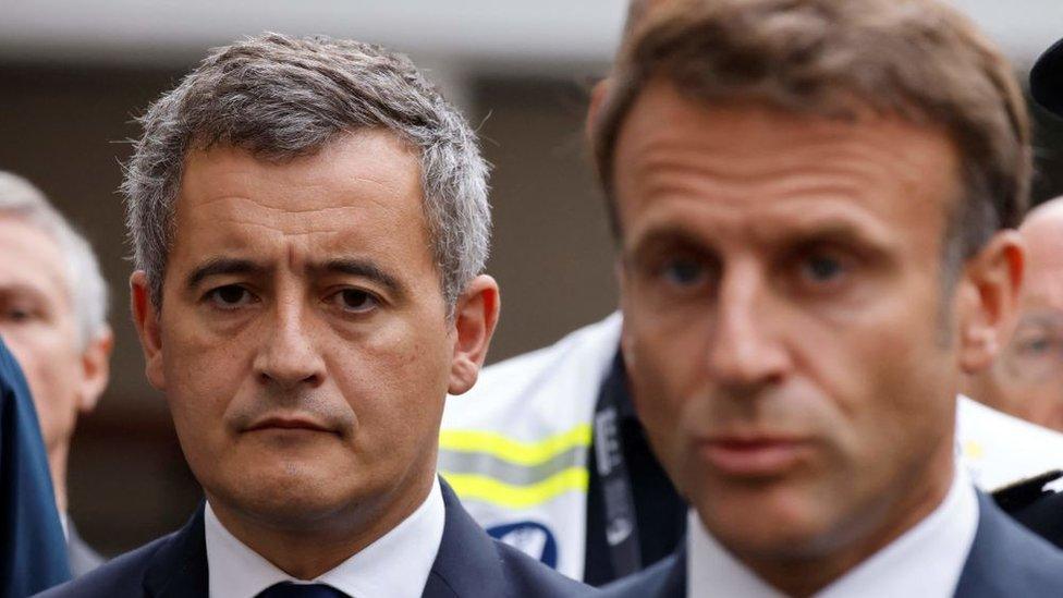 Gérald Darmanin (L) joined President Emmanuel Macron in Arras on 13 October after a teacher was fatally stabbed at a high school