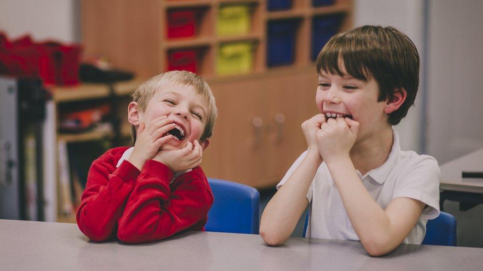 boys-laughing-at-joke.