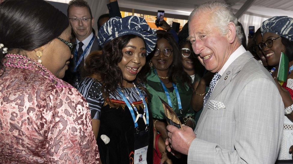 The Prince of Wales attends a Commonwealth Business Forum Exhibition at Kigali Cultural Exhibition Village, as part of his visit to Rwanda