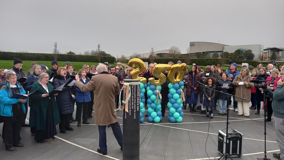 People singing to mark the 250th anniversary of the day the words of Amazing Grace were first delivered