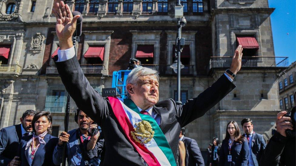 The new President of Mexico, Andres Manuel Lopez Obrador (C), arrives at the National Palace, in Mexico City