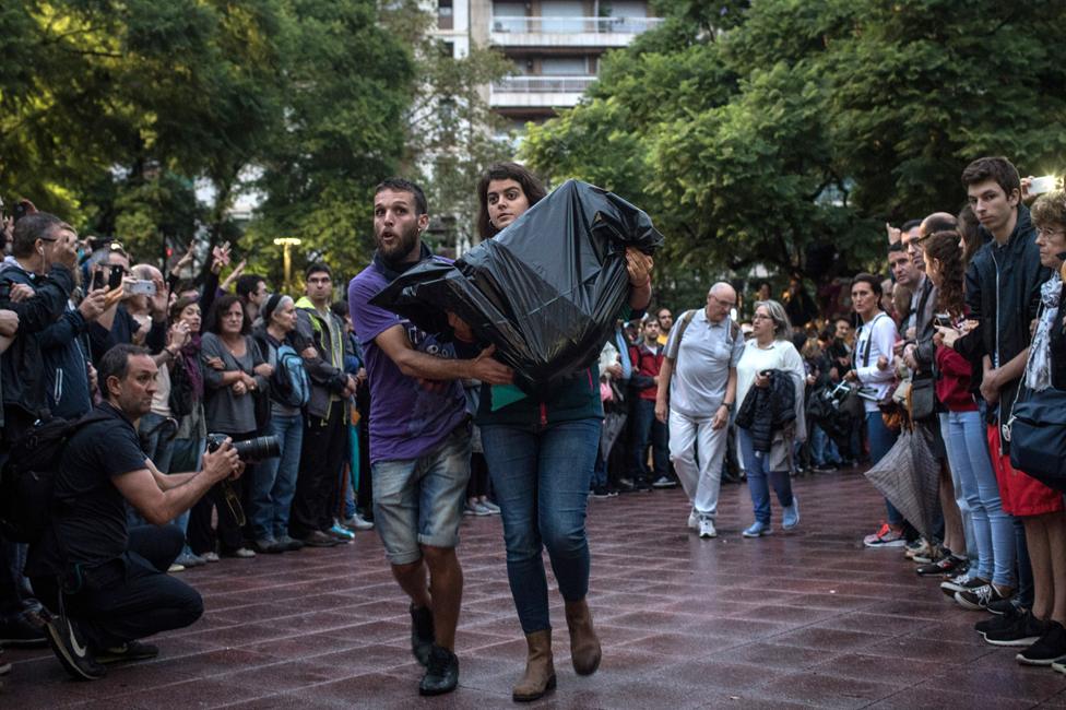 Ballot boxes are delivered to a Barcelona polling station on 1 October 2017