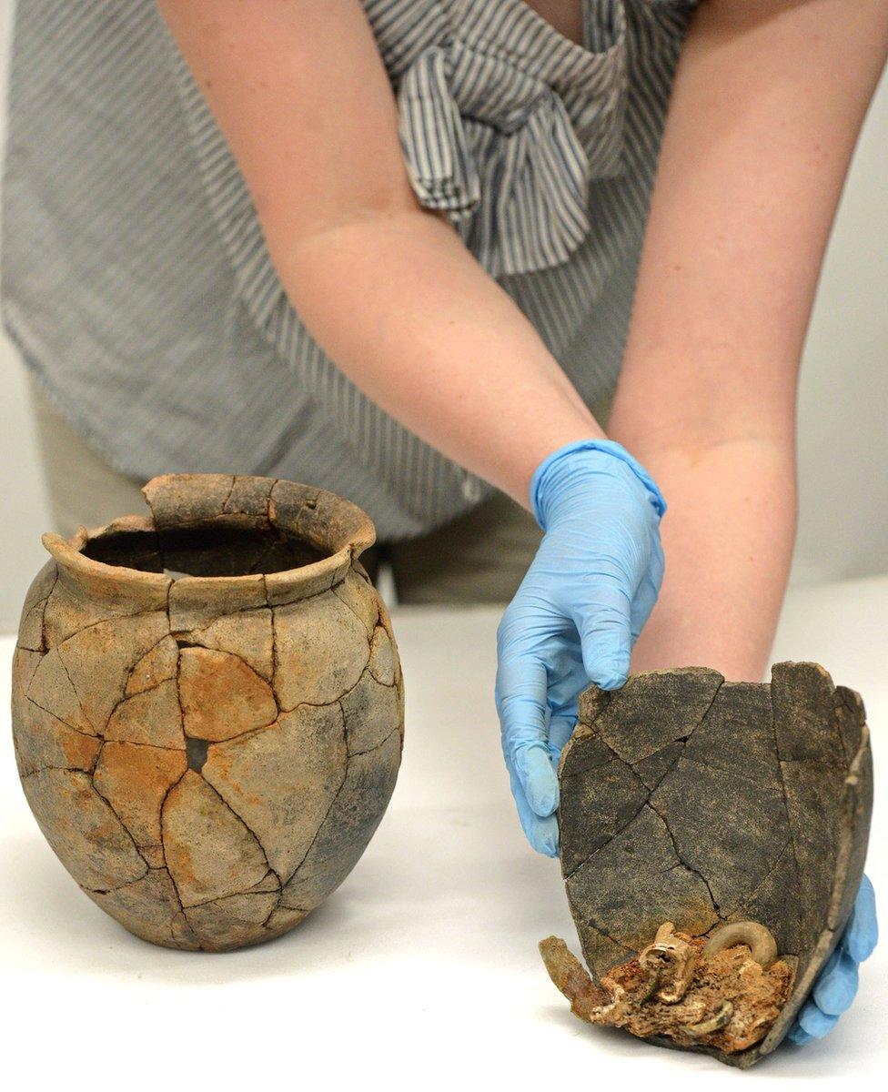 Roman cremation urns, containing the remains of a young woman and a five-year-old child