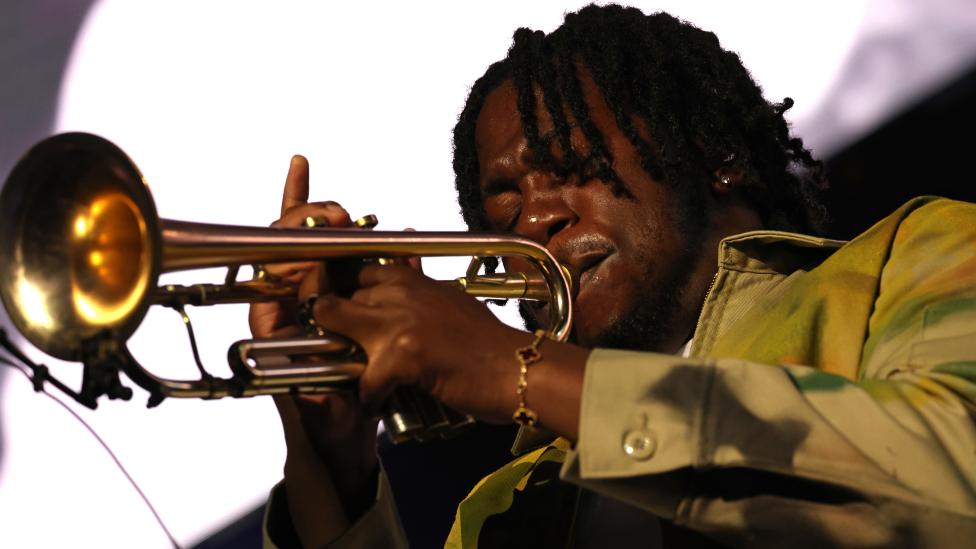 Ife Ogunjobi of Ezra Collective performs onstage during The Mercury Prize 2023 awards show at Eventim Apollo on September 07, 2023 in London, England