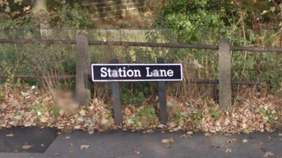 Street sign for Station Lane in Pontefract