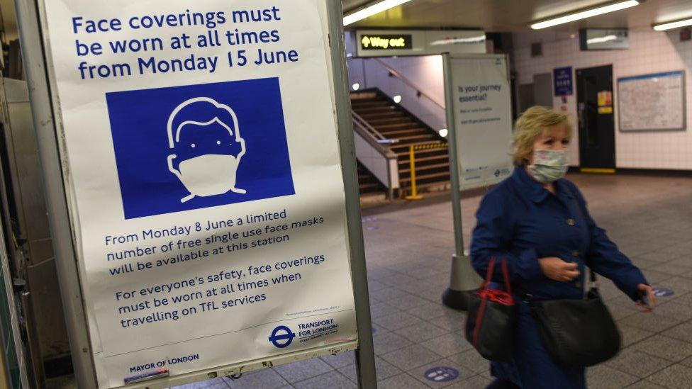 Face covering board in London Underground