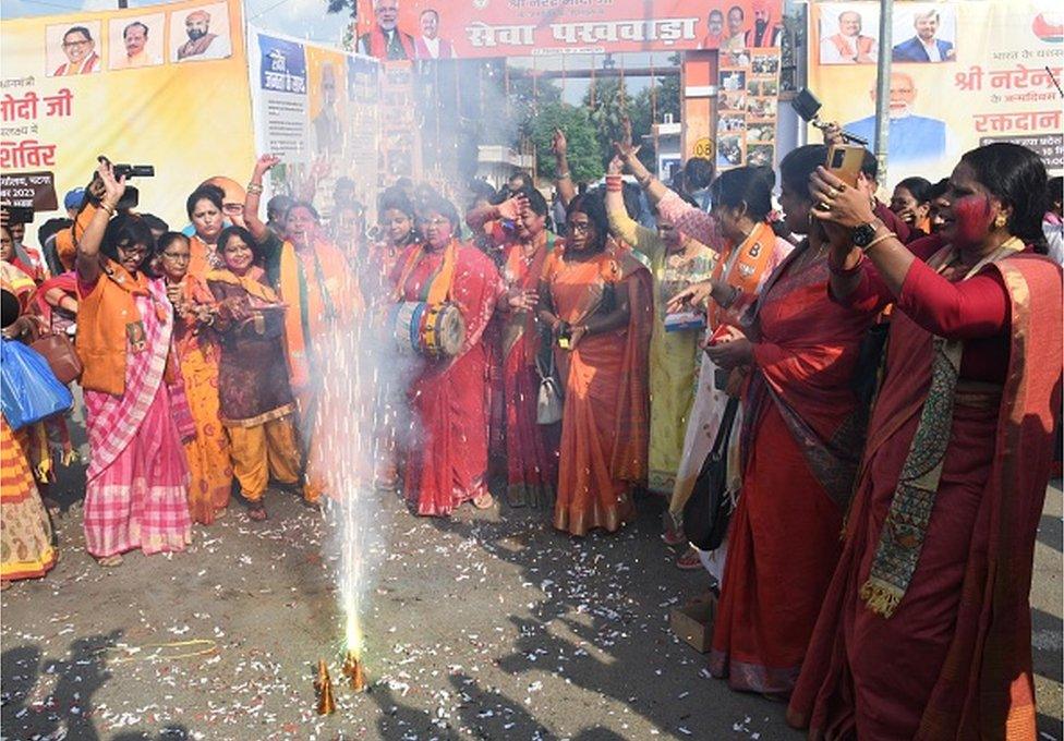 BJP activists celebrate the introduction of Women's reservation bill in Parliament at the party office in Patna on September 19, 2023