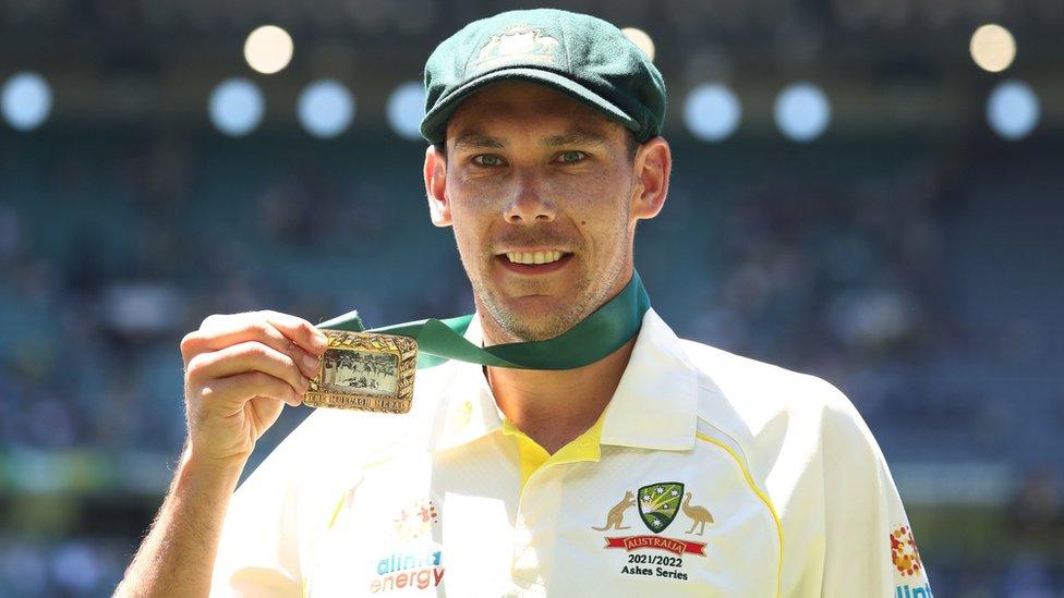 Scott Boland celebrates with his man of the match award during day three of the third Ashes test at the Melbourne Cricket Ground, Melbourne