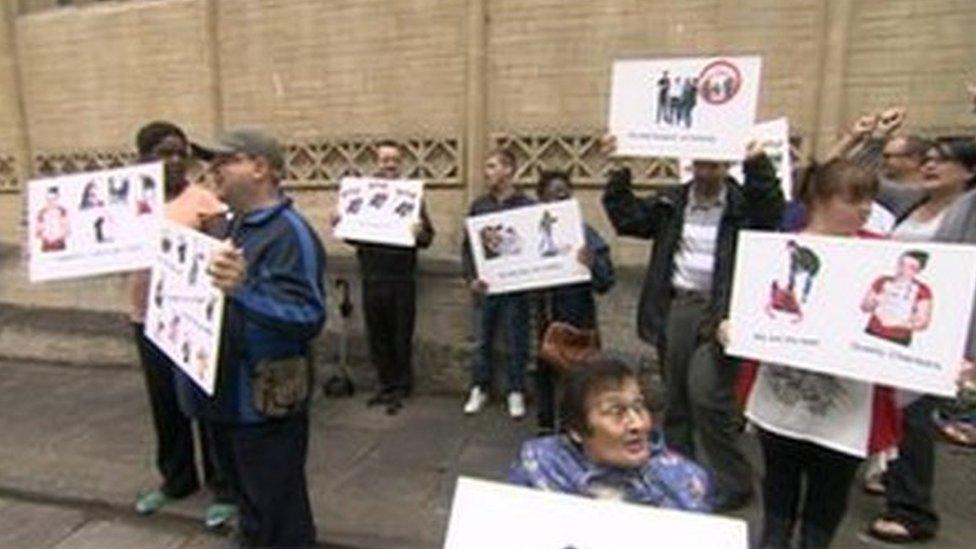 Campaigners against the abuse of people with learning disabilities outside Bristol Crown Court