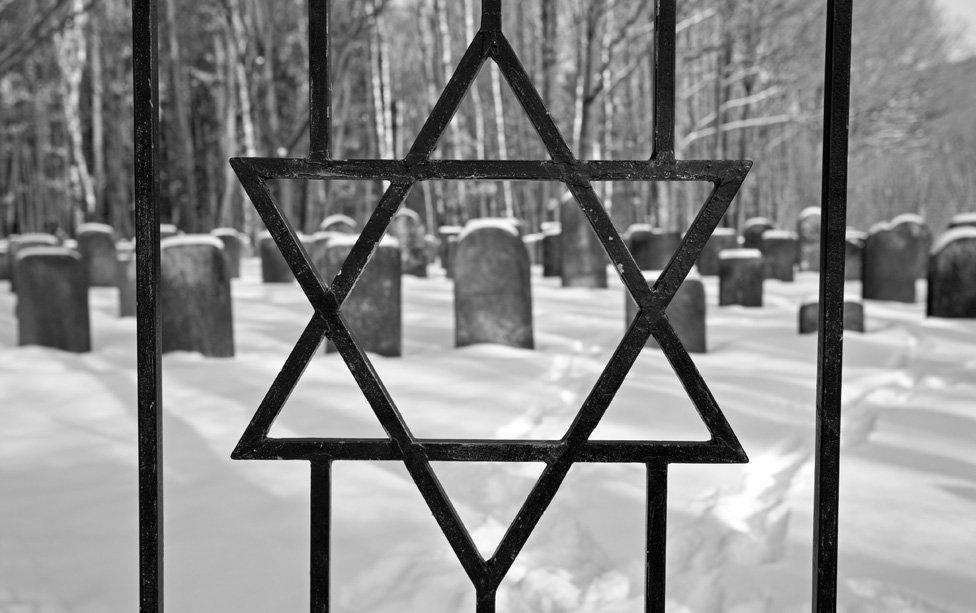 Star of David in railings of Jewish cemetery