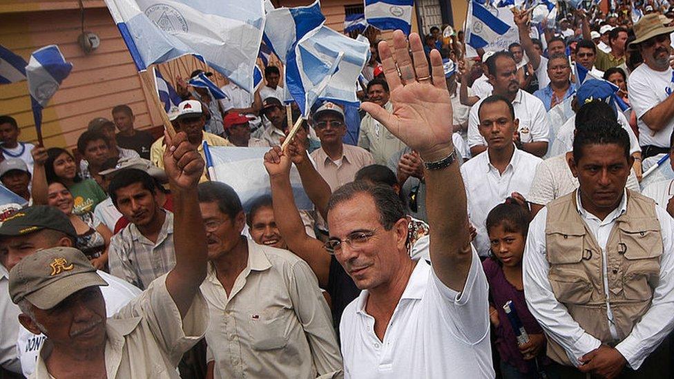 Opposition leader Eduardo Montealegre heads a protest against the Ortega government