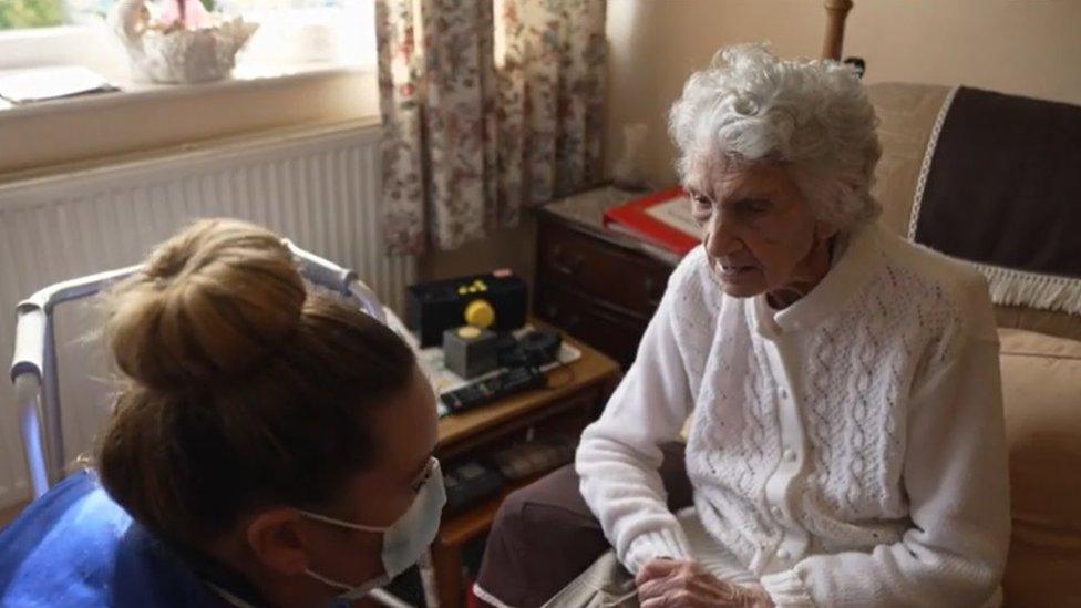 Care worker supporting 103 year old Margaret to live in her own home