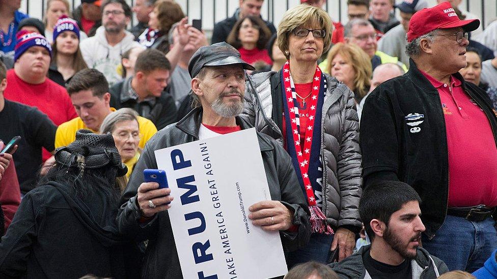 Donald Trump fans gather at a rally in Michigan.