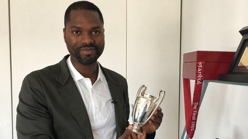 Salif Diao with his cups and medals