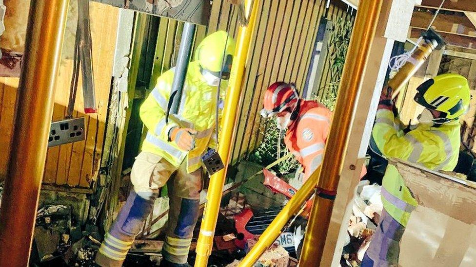 Firefighters make the kitchen safe after crash in Northfield