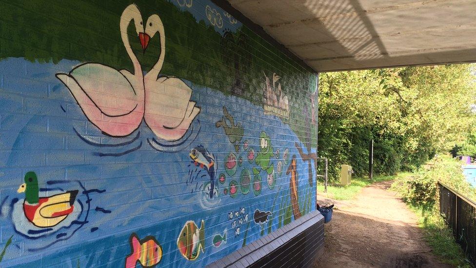 Swans and ducks mural