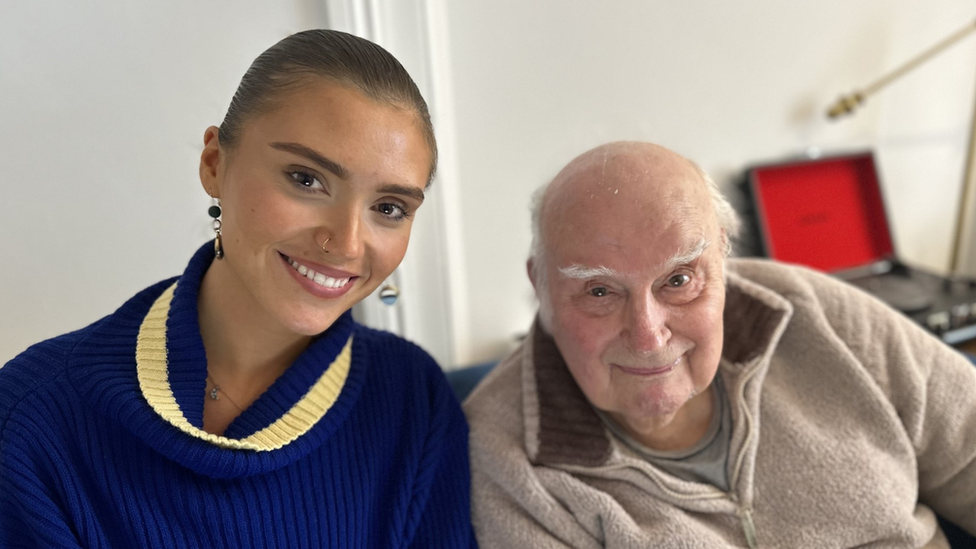 Jasmine White next to her grandad Derrick Martin