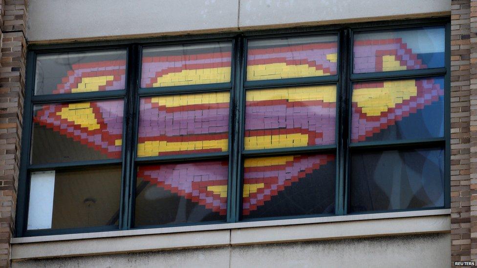 Superman logo on window