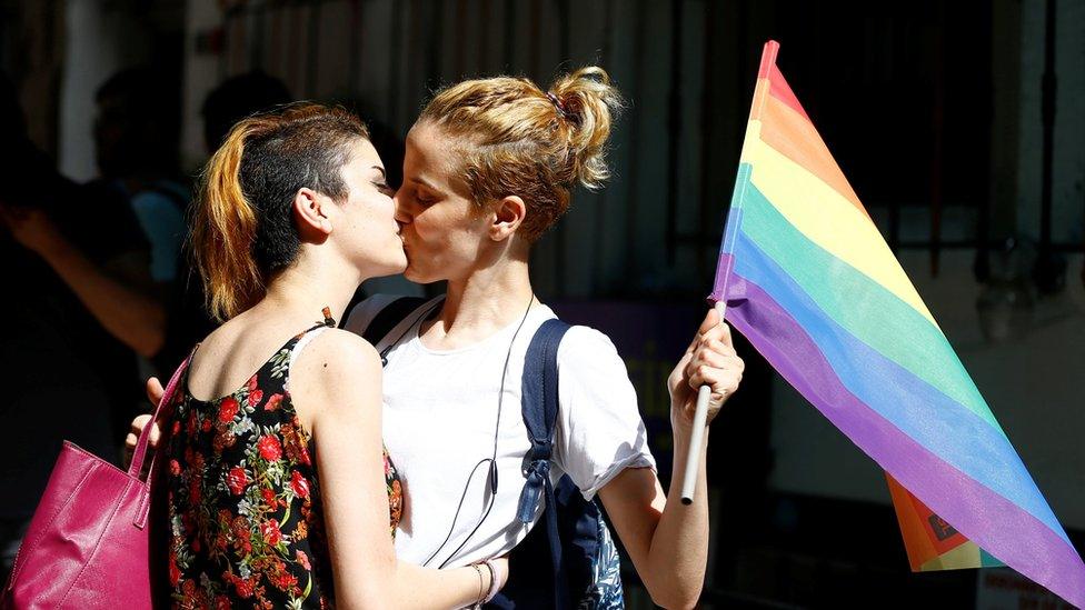 Two activists kiss at the banned Istanbul Trans Pride event, 19 June