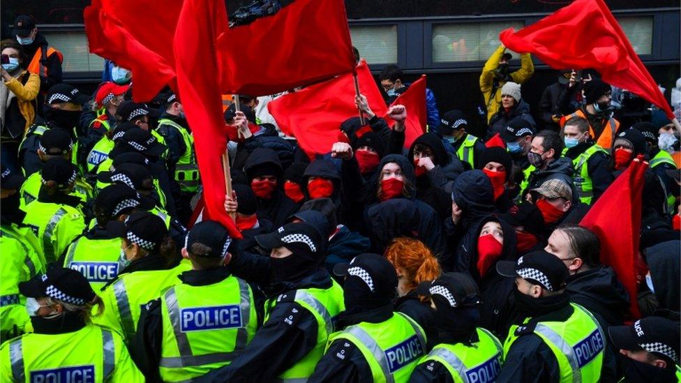 Police containing Youth Communist League members