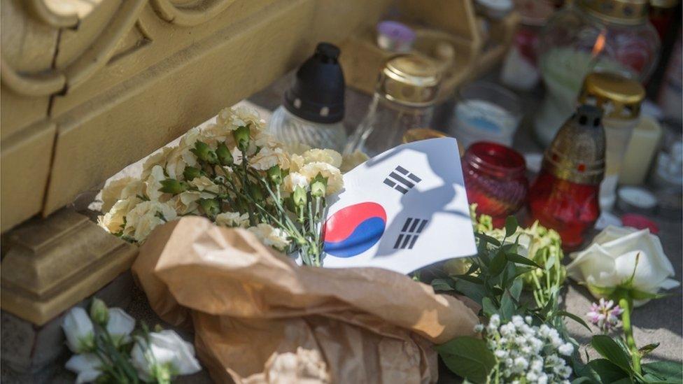 Tributes laid on the banks of the Danube