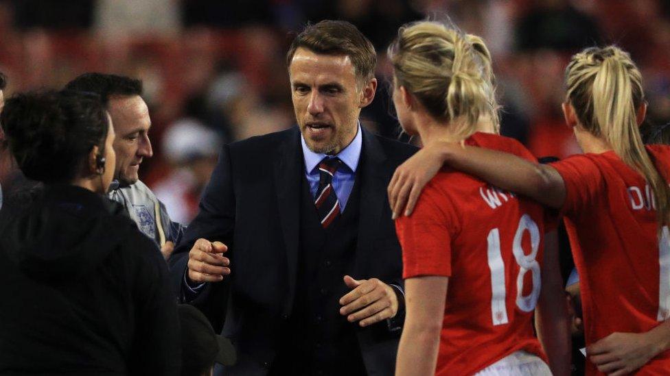 Phil Neville head coach of England talks to players after the 2019 SheBelieves Cup match between England and Japan