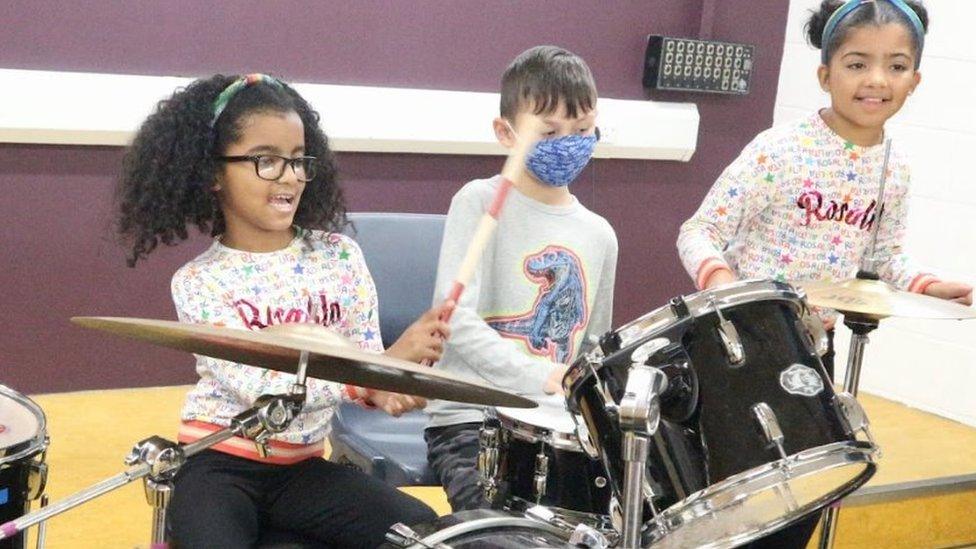 children playing drums