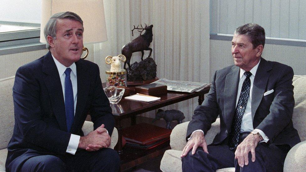 Mulroney sitting beside Ronald Reagan