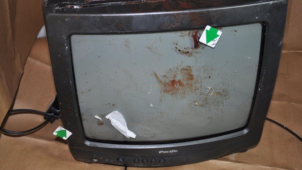 A blood-stained television