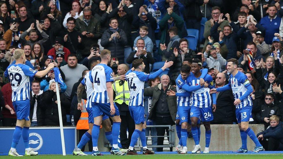 Brighton players celebrate