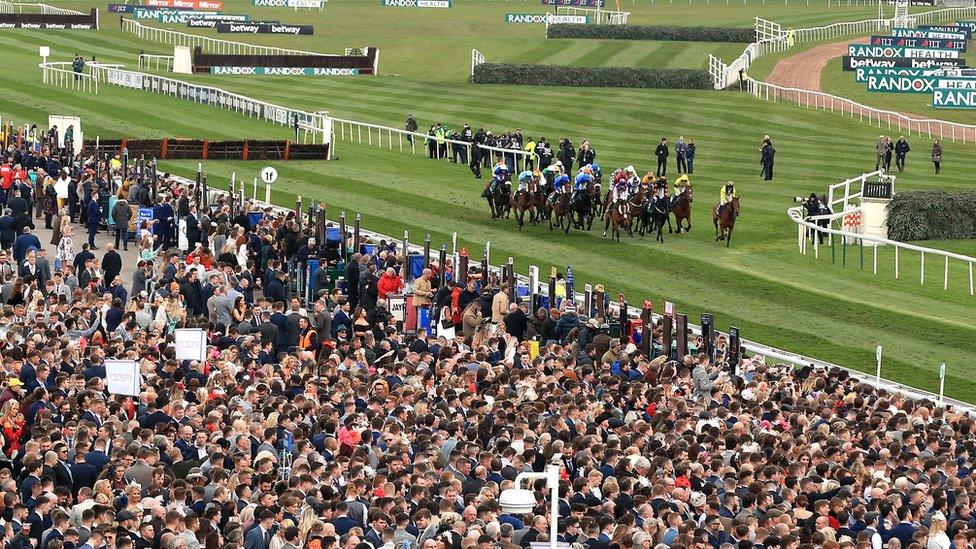 Crowds of racegoers at the Grand National