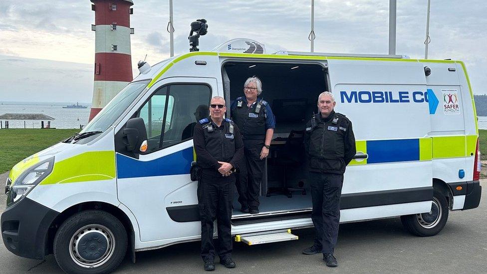 The new CCTV van with three police officers standing in front of it on Plymouth Hoe