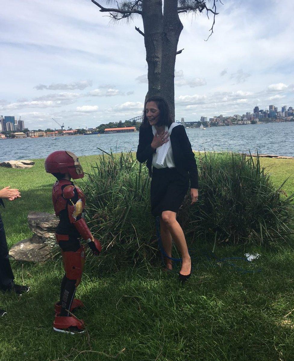 Iron Boy saves Make-A-Wish's Hope Joy after riding a police speedboat across Sydney Harbour