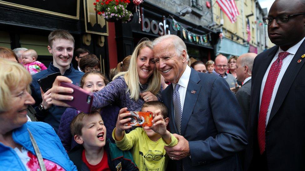 Mr Biden poses for selfies with wellwishers in Castlebar