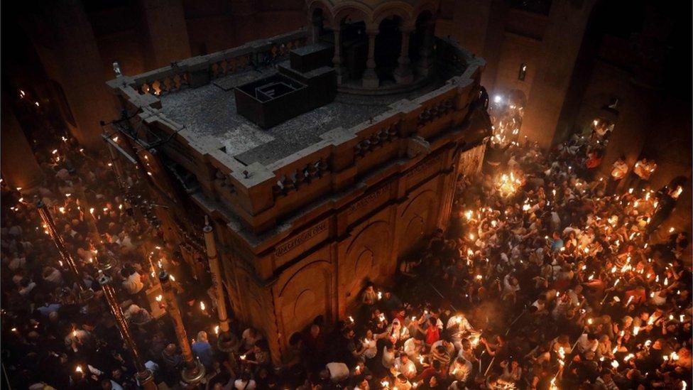 Orthodox Christians in the Church of the Holy Sepulchre in Jerusalem