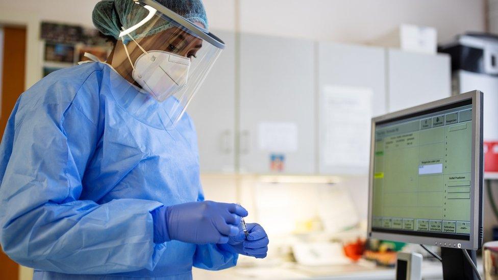 Medical staff member in PPE in hospital