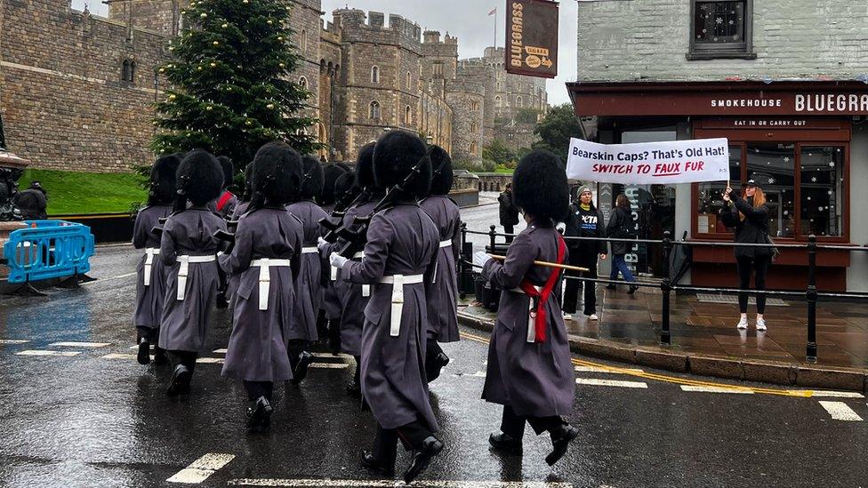 soldiers and Peta protesters