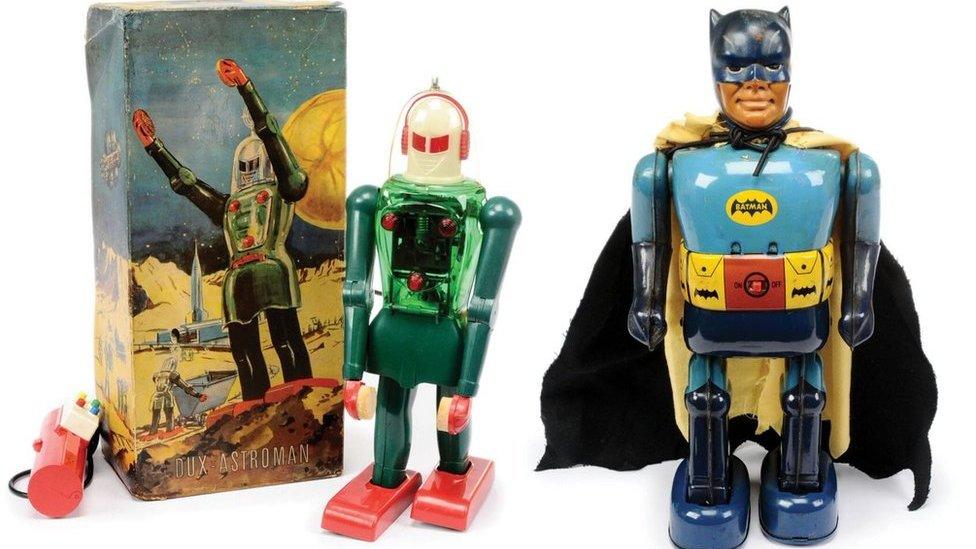 Toy robot and Batman robot