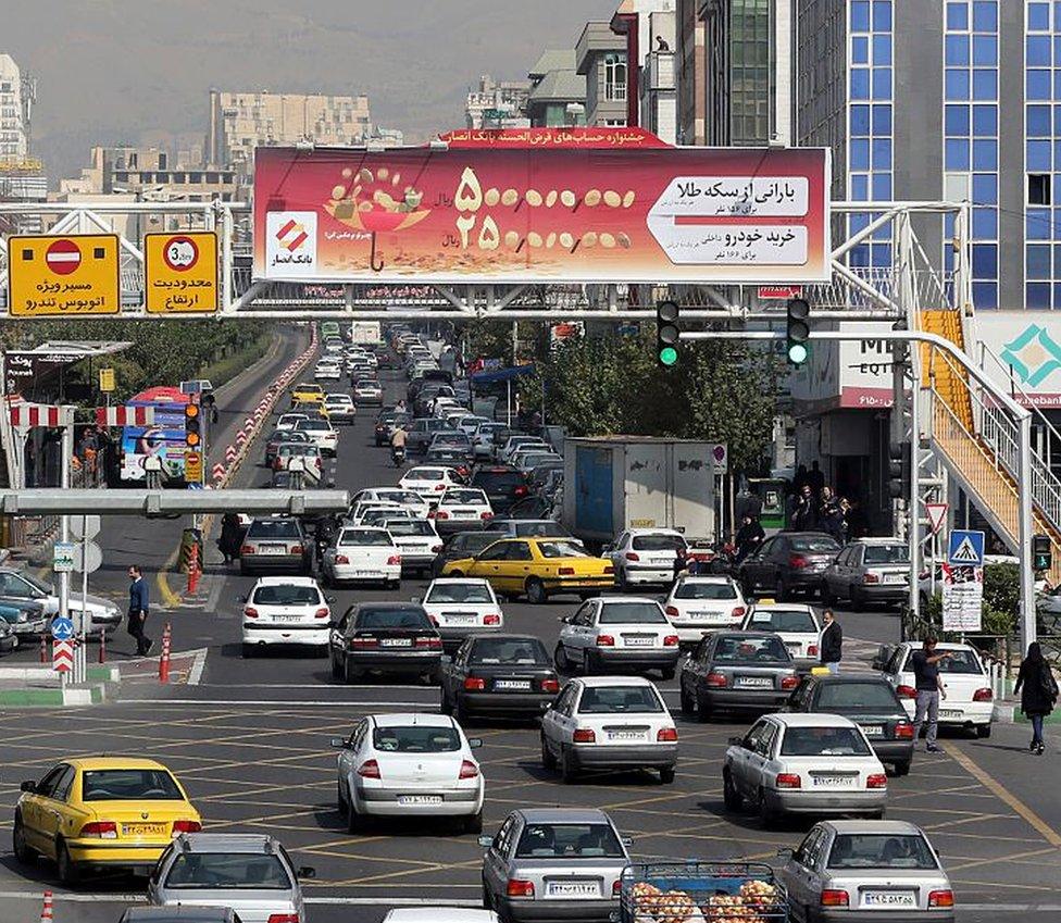 Cars on a street in the northwest of the capital Tehran