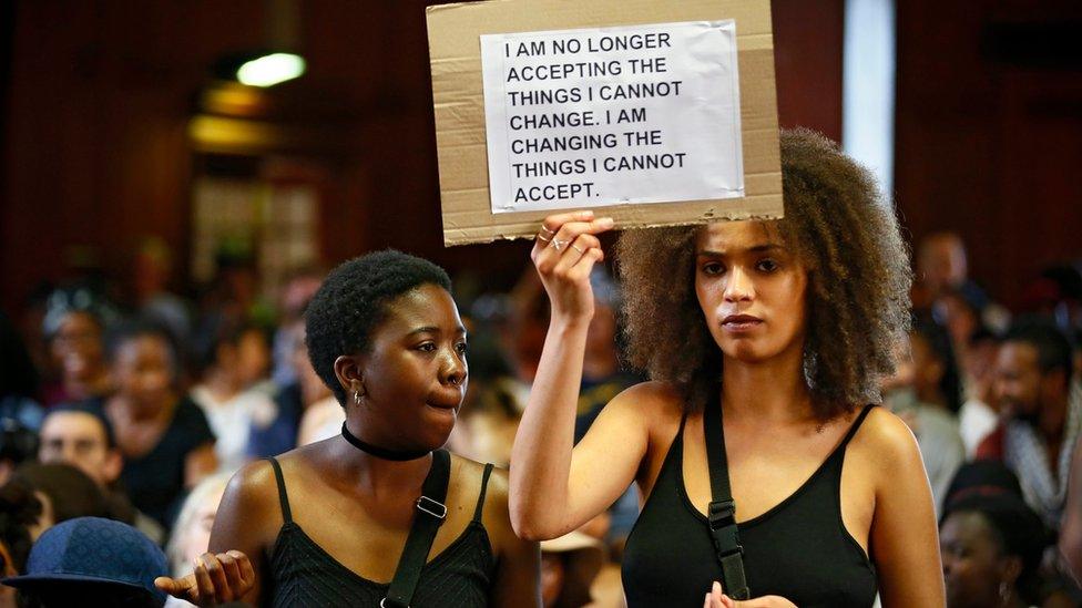 Students protest during a mass student meeting under the banner #FeesMustFall at the University of Cape Town (UCT), South Africa, 19 September 2016.