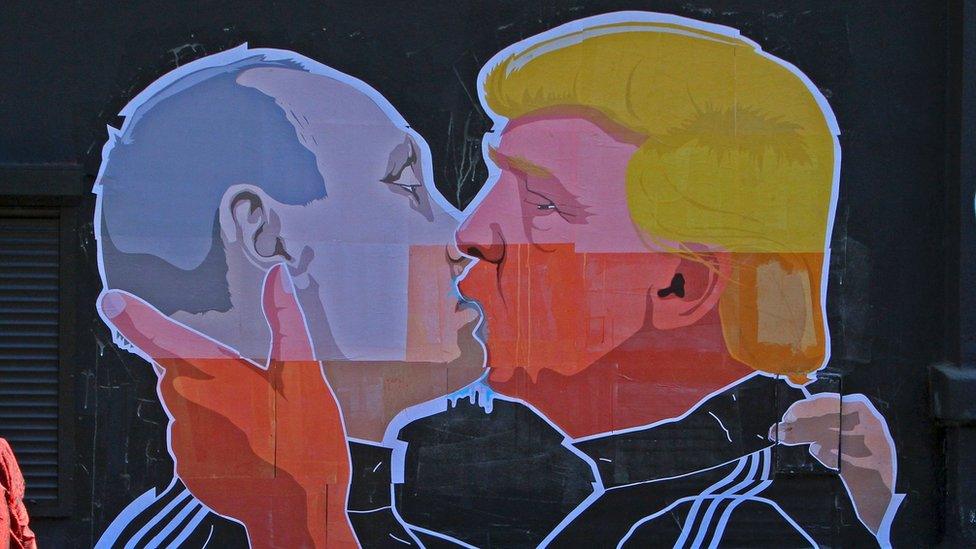 Graffiti showing Vladimir Putin and Donald Trump embracing