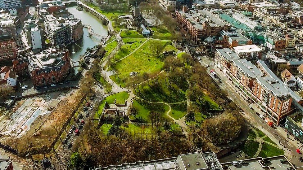 Aerial view of Bristol city centre with Castle Park in the foreground