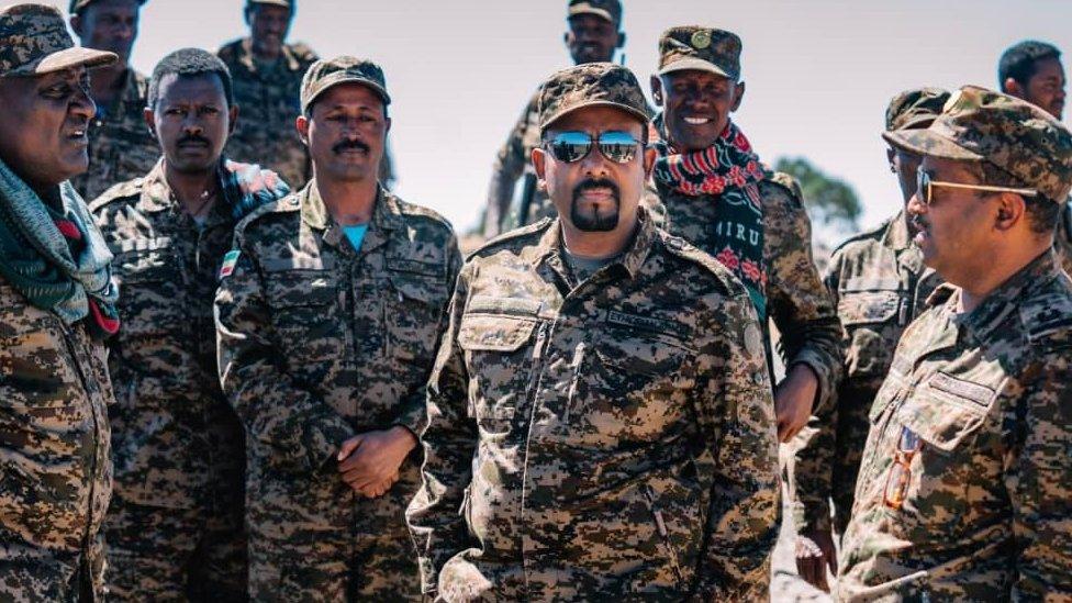 Abiy Ahmed pictured on the front line in sunglasses