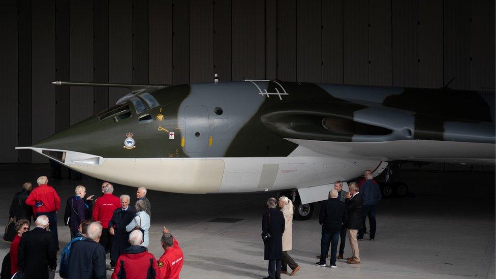 Cold War veterans, many of whom operated or worked on this very aircraft, admire the Handley Page Victor XH648 aircraft, which is on show at IWM Duxford, Cambridgeshire, following the completion of a five year restoration project